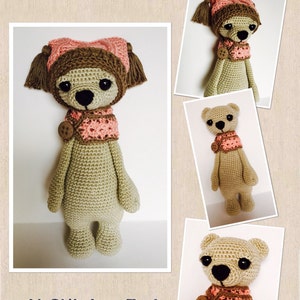 May include: A crocheted stuffed animal bear wearing a pink hat with brown tassels and a pink scarf. The bear has brown eyes and a brown nose. The bear is standing on a white background. The text "At Stitches End" is below the bear.