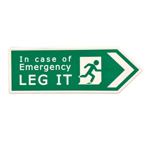 May include: A green and white sign with a white arrow pointing to the right. The sign says "In case of Emergency LEG IT" and has a stick figure running through a doorway.