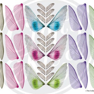 May include: A collection of dragonfly wing designs in various colors, including pink, blue, green, and purple. The wings are arranged in pairs and sets, with intricate vein details. The Crafty Kit Company 2019 is printed at the bottom right.