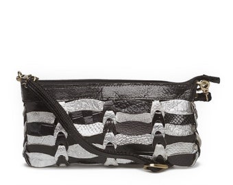 Style Elfa in black/silver. The cool, smaller crossbody / clutch / shoulder bag braided in leather from Octopus Denmark