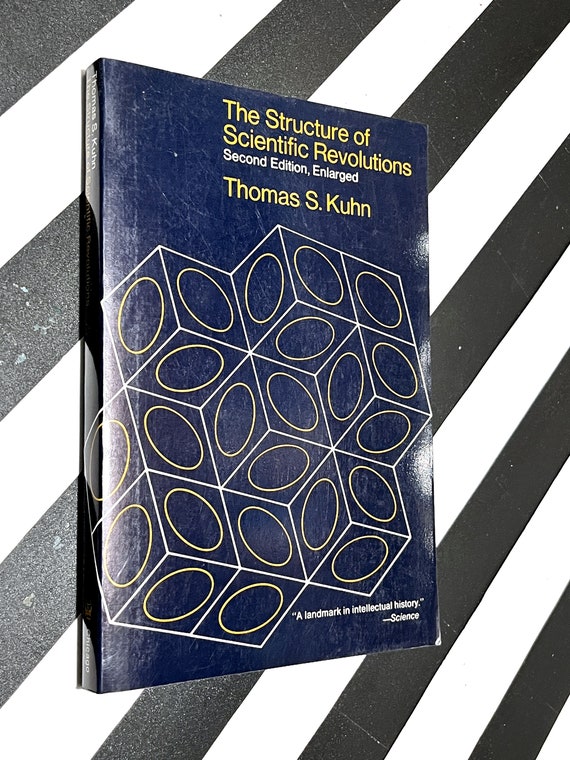 The Structure of Scientific Revolutions by Thomas Kuhn (1962) softcover book