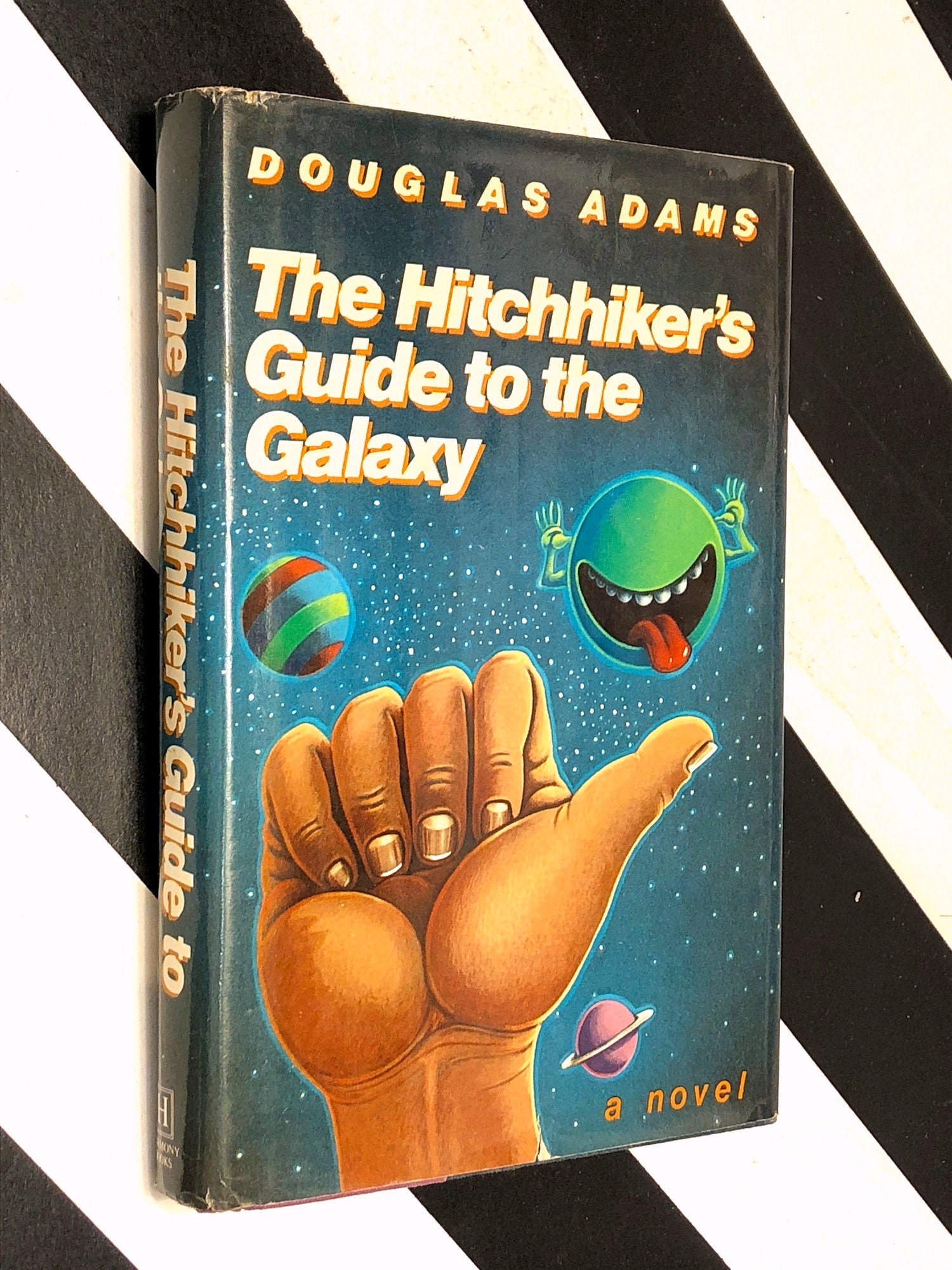 The Hitchhiker's Guide to the Galaxy by Douglas Adams (1979) first