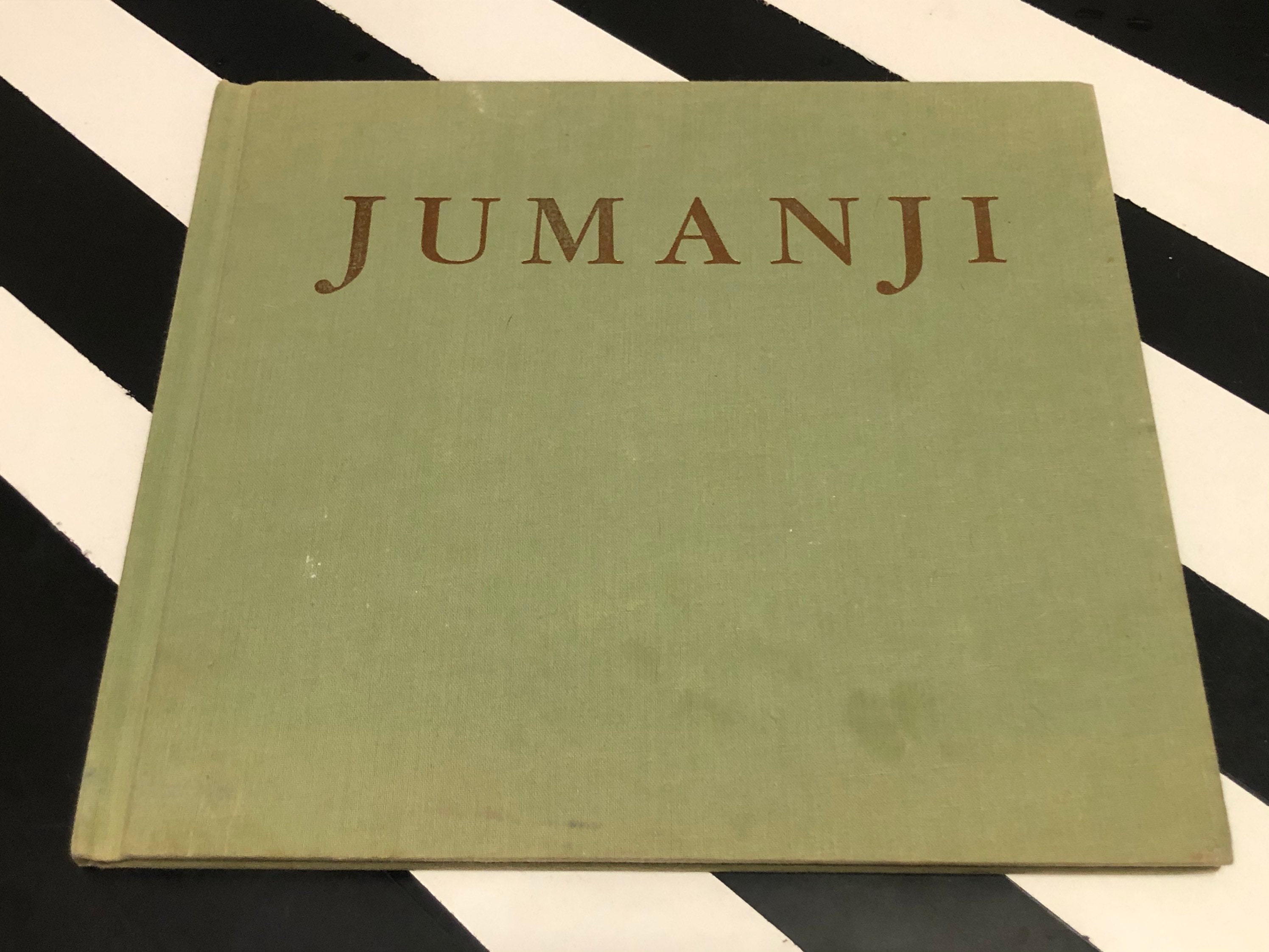 Jumanji written and Illustrated by Chris Van Allsburg (1981) hardcover book