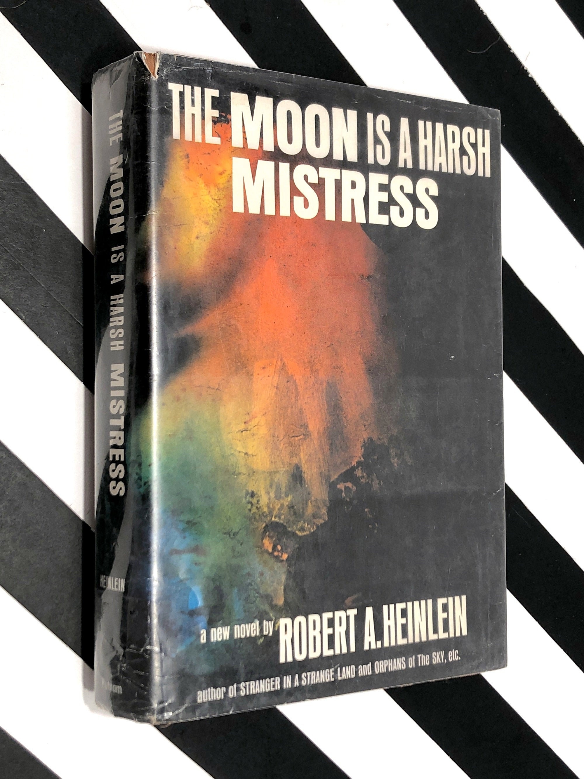 The Moon is a Harsh Mistress by Robert Heinlein (1966) first edition book The Moon is a Harsh Mistress by Robert Heinlein (1966) first edition book