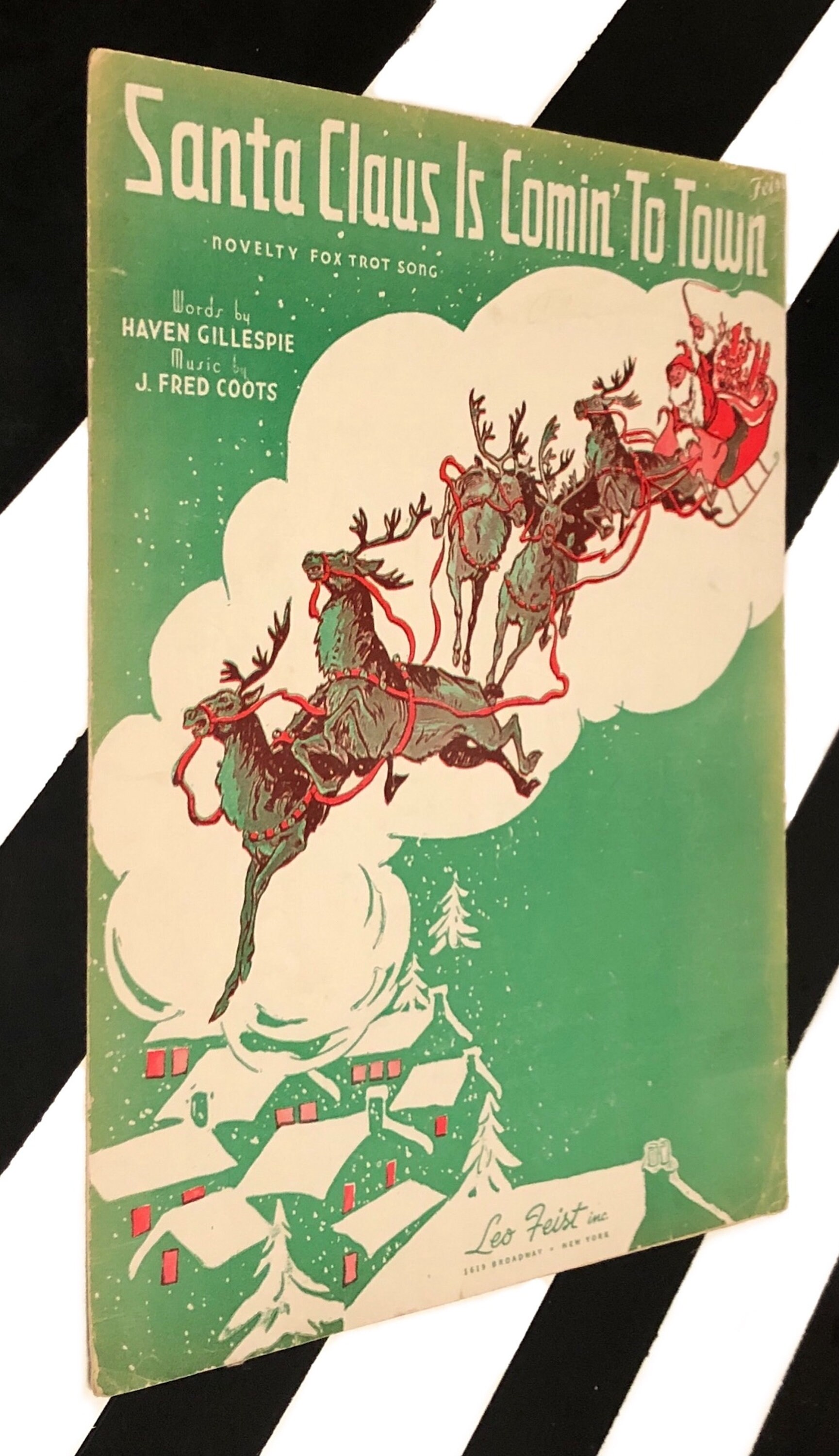 Santa Claus is Comin' to Town words by Haven Gillespie and Music by J. Fred Coots (1934