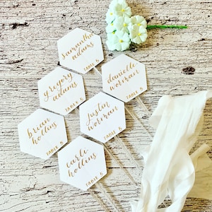 Calligraphy White Hexagon Cocktail Stirrers Place Cards | Champagne Flute Glass Escort Cards | Sip and Be Seated Wedding Theme.
