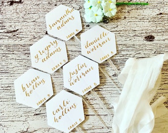 Calligraphy White Hexagon Cocktail Stirrers Place Cards | Champagne Flute Glass Escort Cards | Sip and Be Seated Wedding Theme.