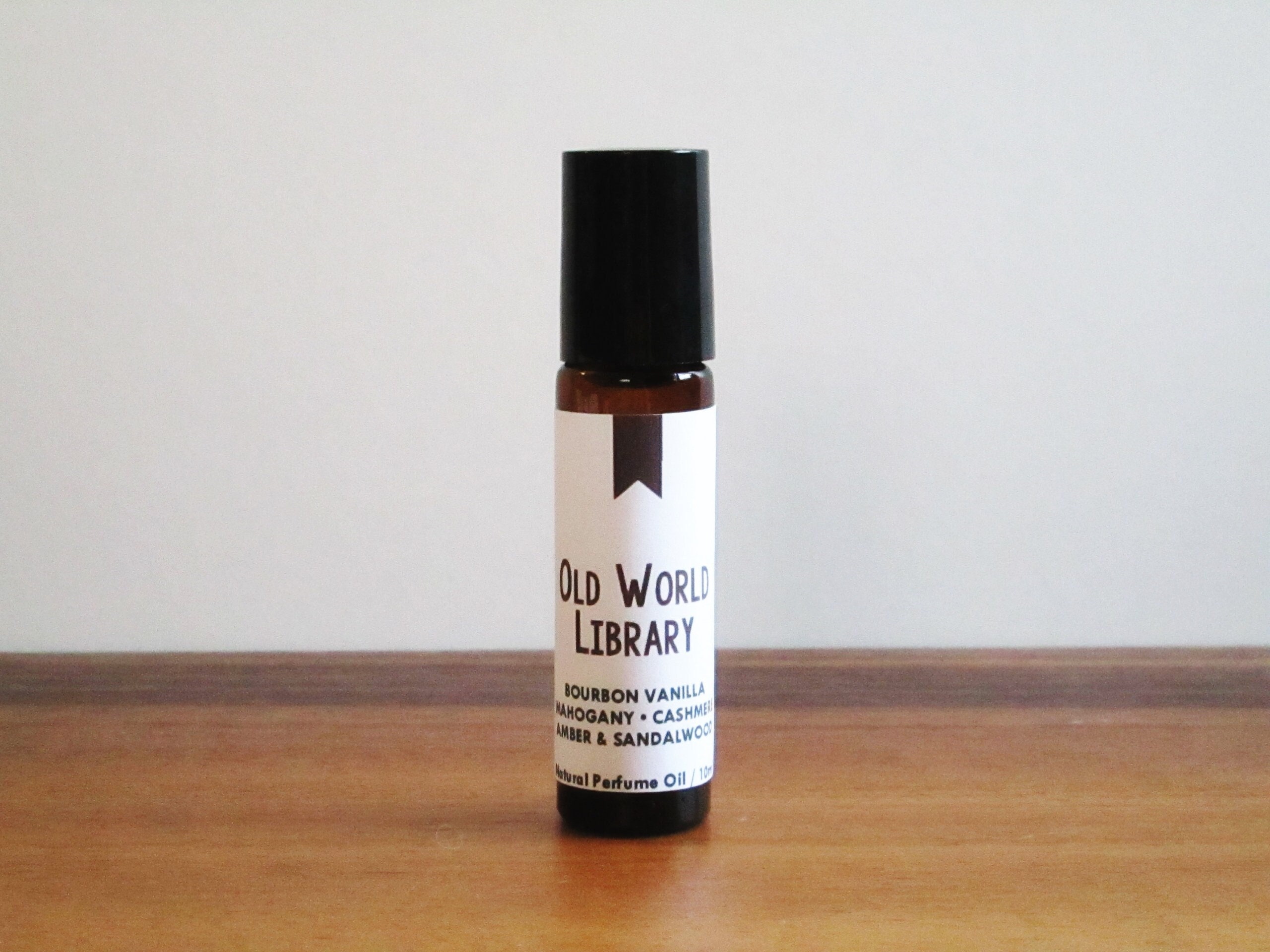 OLD WORLD LIBRARY Bourbon Vanilla Mahogany Cashmere Amber Sandalwood Book Inspired Library Collection Roll On Perfume Oil