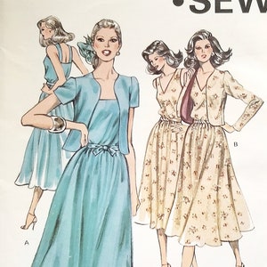 May include: A sewing pattern for a dress with a jacket. The pattern is for sizes 6-8-10-12. The pattern is from Kwik-Sew Pattern Co., Inc. and is designed by Kerstin Martensson.