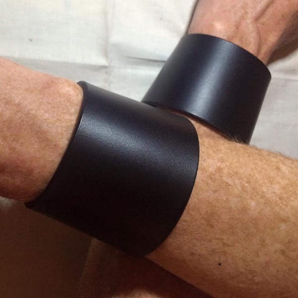 The Defender Leather Wrist Band in thick black cowhide