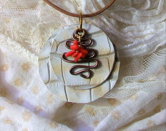 Necklace with leather cord and pendant of processed leather, aluminum and coral, handmade Framarida