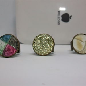 Bronze band ring, decorated with handmade leather scraps, adjustable size