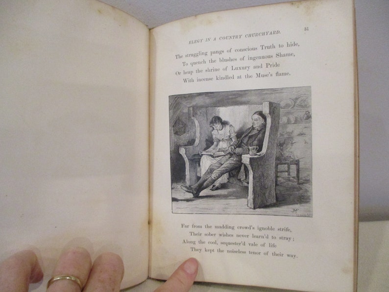 May include: A black and white illustration of a man and a woman sitting in a church pew. The man is reading a book and the woman is looking at him. The text "ELEGY IN A COUNTRY CHURCHYARD" is visible at the top of the page.