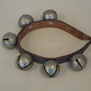sleigh bells on leather,large jingle bells,rustic decor,shop keeper doorbell,mounted bells on leather,harness bells,Christmas jingle bells