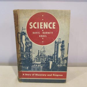May include: A vintage hardcover book titled "Science: A Story of Discovery and Progress" by Davis Burnett Gross. The cover features a red circle with the word "Science" in white lettering and a blue and white illustration of an industrial complex.