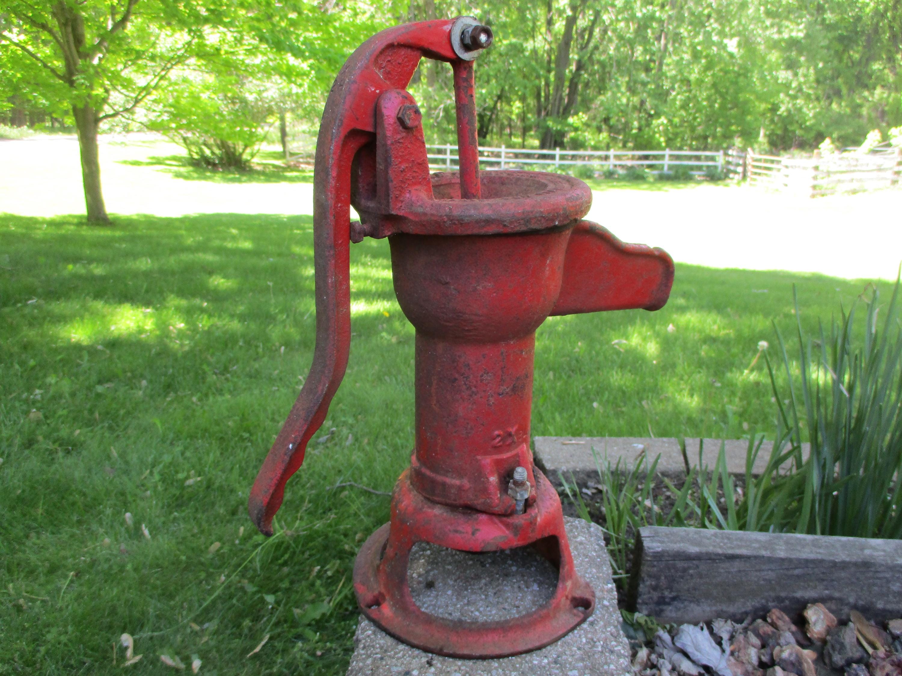 antique hand pump,water pump,red pitcher pump,cast iron hand pump,cistern pump,garden decor,Duplex Mfg pump,Superior Wisconsin,Davey Pump