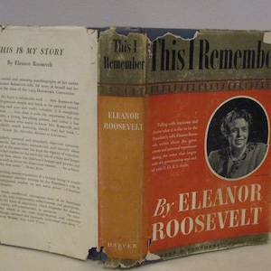 May include: A vintage book cover in blue, orange and red colours. The title is "This I Remember" by Eleanor Roosevelt. The cover features a black and white photograph of Eleanor Roosevelt.