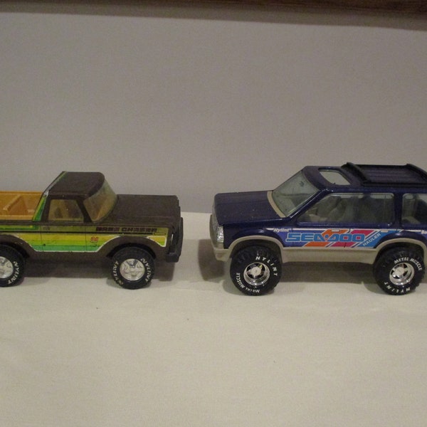 2 Nylint Trucks,Nylint Brown Bronco,Nylint Blue Bombardier,Seadoo Hauler,Nylint Bass Chaser,Nylint toy trucks,scale model SUV,steel truck