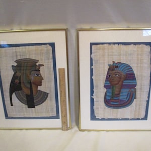 2 framed papyrus paintings,Cleopatra Papyrus,King Tut Papyrus,Egyptian Art,Egyptian Papyrus pictures,Egypt,King Tutankhamun,ancient Egypt