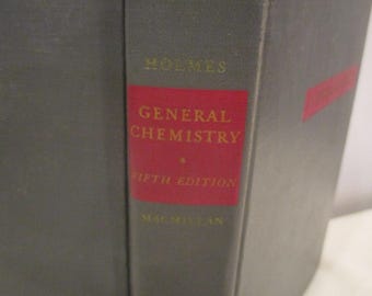 May include: A close-up of a book spine. The book is titled "General Chemistry" and is the fifth edition. The author's name, Holmes, is at the top, and the publisher, Macmillan, is at the bottom. The spine is gray with a red label.