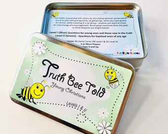 May include: A green and white tin box with a bee illustration and the text "Truth Bee Told Young Christians Levels I & II". The box contains 80 game cards for children ages 4 and up.
