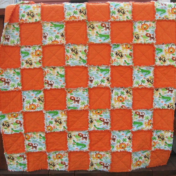 Orange and White Jungle Themed Crib sized Flannel Rag Quilt with Lions and Tigers