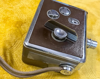Cámara de cine vintage Revere 8 Modelo 40 en funcionamiento