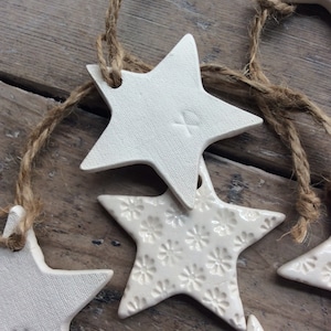 Handmade ceramic white star ornament with daisy design. Christmas gift tags, decorations, wedding, favours. Made with white clay image 3