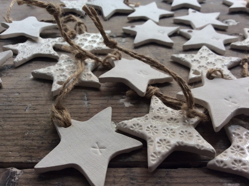 Handmade ceramic white star ornament with daisy design. Christmas gift tags, decorations, wedding, favours. Made with white clay image 6