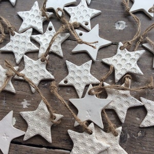 Handmade ceramic white star ornament with daisy design. Christmas gift tags, decorations, wedding, favours. Made with white clay image 5