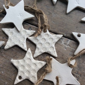 Handmade ceramic white star ornament with daisy design. Christmas gift tags, decorations, wedding, favours. Made with white clay image 4