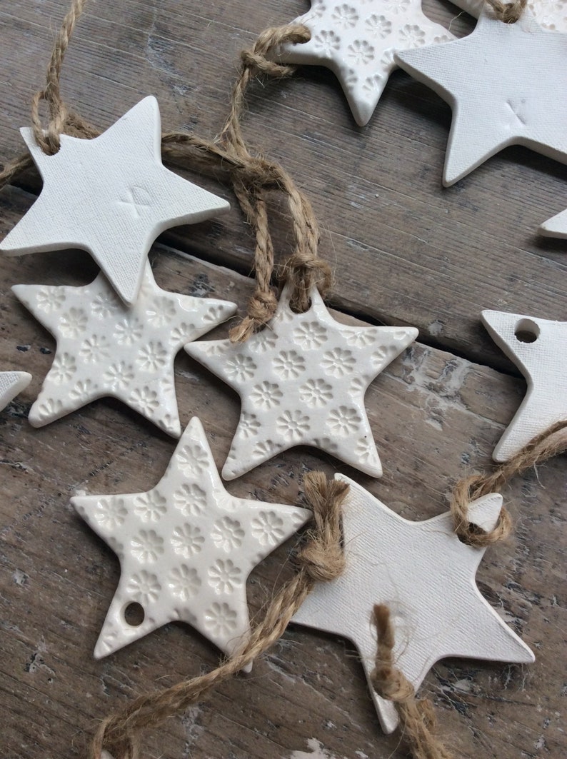 Handmade ceramic white star ornament with daisy design. Christmas gift tags, decorations, wedding, favours. Made with white clay image 4