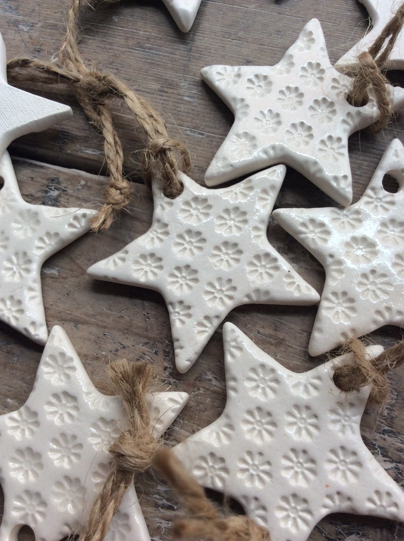 Handmade ceramic white star ornament with daisy design. Christmas gift tags, decorations, wedding, favours. Made with white clay image 2