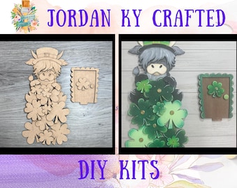 May include: Two DIY craft kits featuring a wooden cutout of a cow and a donkey wearing a shamrock hat and surrounded by shamrock leaves. The kits are labeled "JORDAN KY CRAFTED DIY KITS".