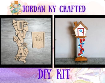 Puede incluir: Kit de manualidades DIY con un recorte de madera de una casa con la palabra "USA" en la parte delantera y un recorte de madera separado de las letras "USA" con fuegos artificiales. El kit es de Jordan Ky Crafted.