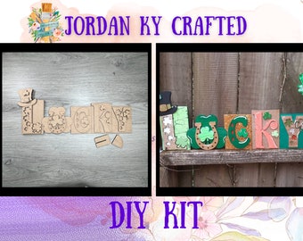 May include: A DIY craft kit to create a "Lucky" sign. The kit includes unfinished wooden pieces shaped like the letters "L-U-C-K-Y" with shamrock and horseshoe designs. The second image shows the finished sign with green, gold, and pink paint.