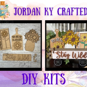 May include: A set of DIY craft kits featuring sunflower designs. The kits include wooden cutouts of sunflowers, a vase, a cutting board, and a sign that says "Stay Wild".