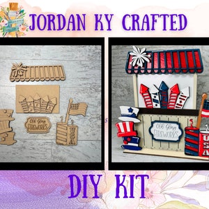 May include: A DIY craft kit featuring a wooden cutout of a fireworks stand with red, white, and blue accents. The kit includes various pieces to assemble the stand, including fireworks, stars, and a sign that reads "Old Glory Fireworks".