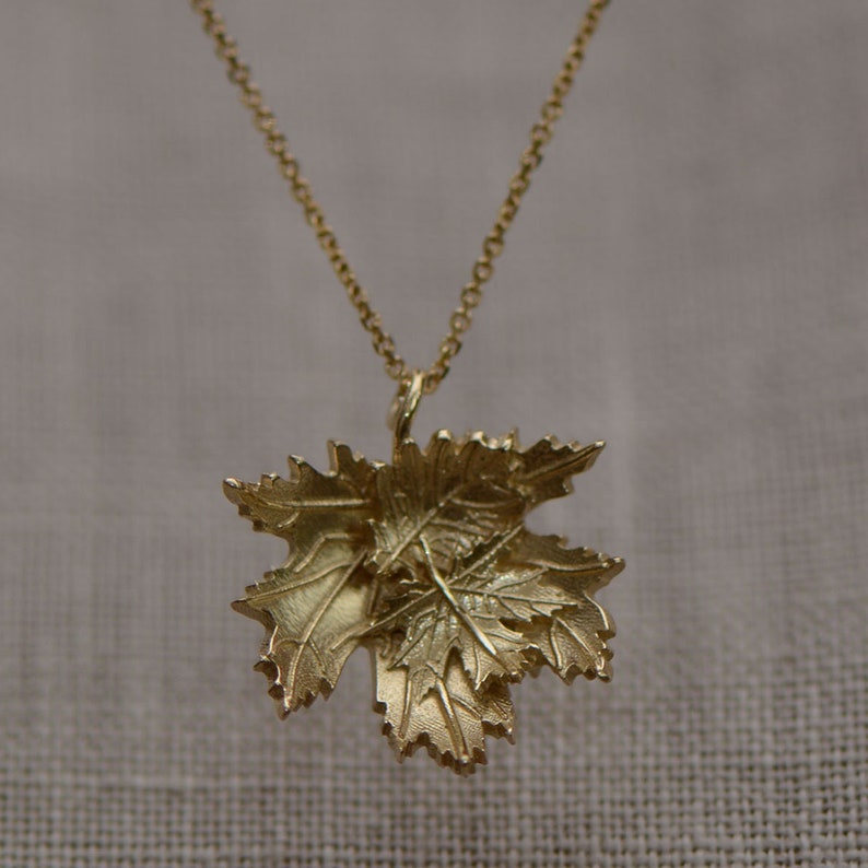 Gold maple leaf pendant Clearance