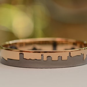 Jerusalem Interlocking Bangle Bracelets in Gold and Silver with Old City Skyline image 1