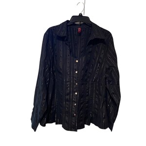 May include: Black button-down shirt with vertical silver stripes. The long-sleeved blouse has a collared neckline and is hanging on a black hanger. The shirt has gold-coloured square buttons.
