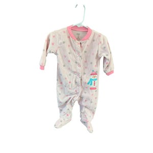 May include: Pink and white baby sleeper with a snowman design and snowflake print. The sleeper has a pink trim and a button closure.