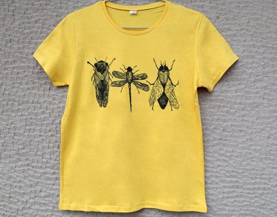 A cicada, a dragonfly and a fly sat on a branch reflecting on their existence