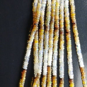 3 strands of shaded Ethopian Opal  shaded plain Rondelle 4-5mm 8&quot;