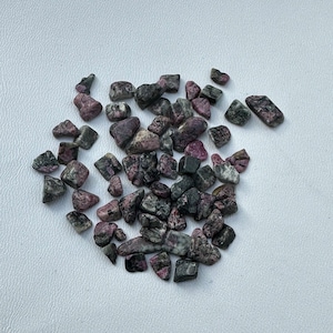 EUDIALYTE inlay chips , tumbled & polished , undrilled , used as decoration and healing properties, packet of 30grams each 4 to 12mm