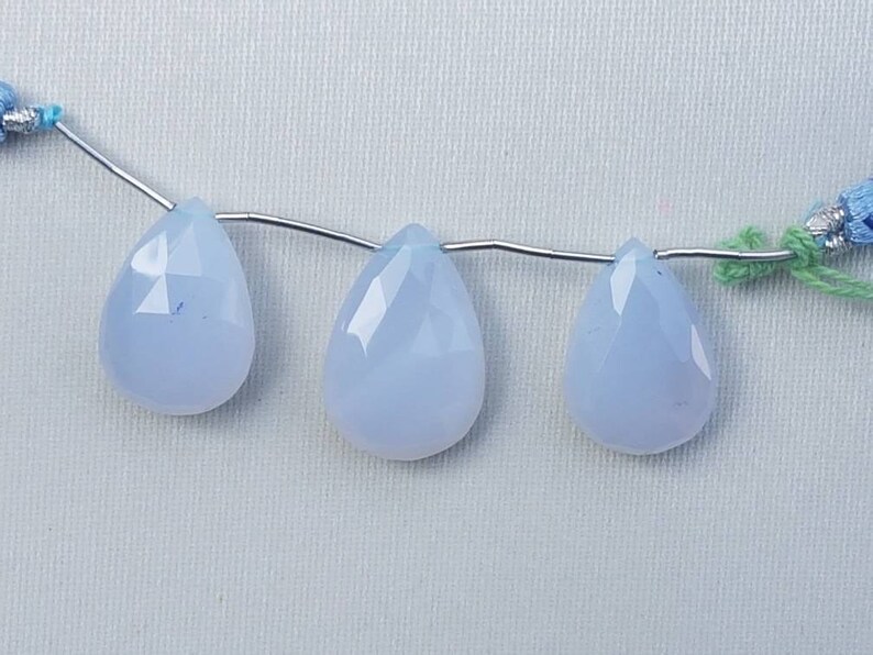 3 pieces of BLUE CALCEDONY PEARS facetted 19x14mm to 14x18mm