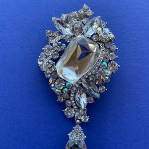 Very large Rhinestone pin statement piece.