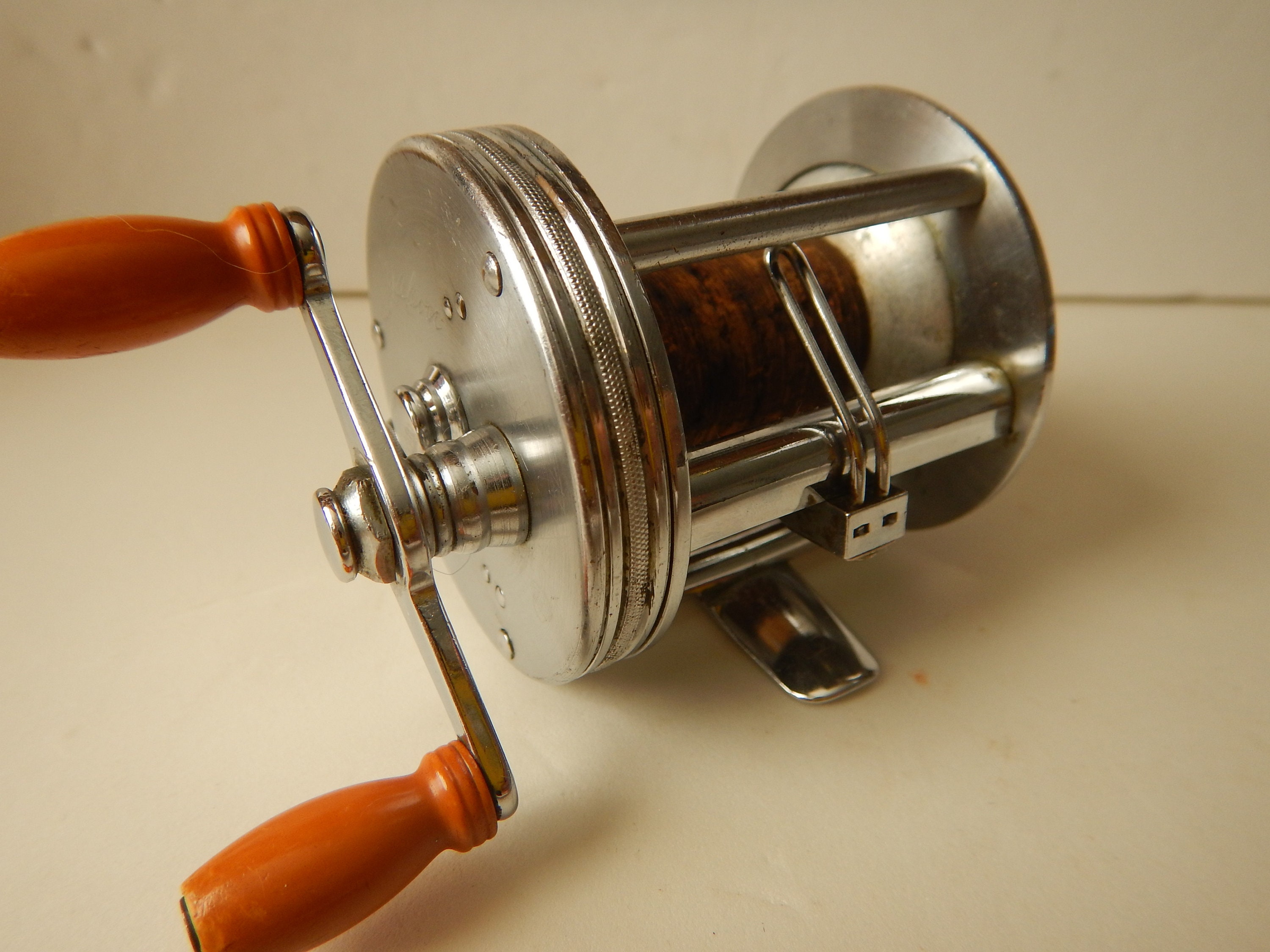 Vintage J. A. Coxe model 60 casting fishing reel. Circa