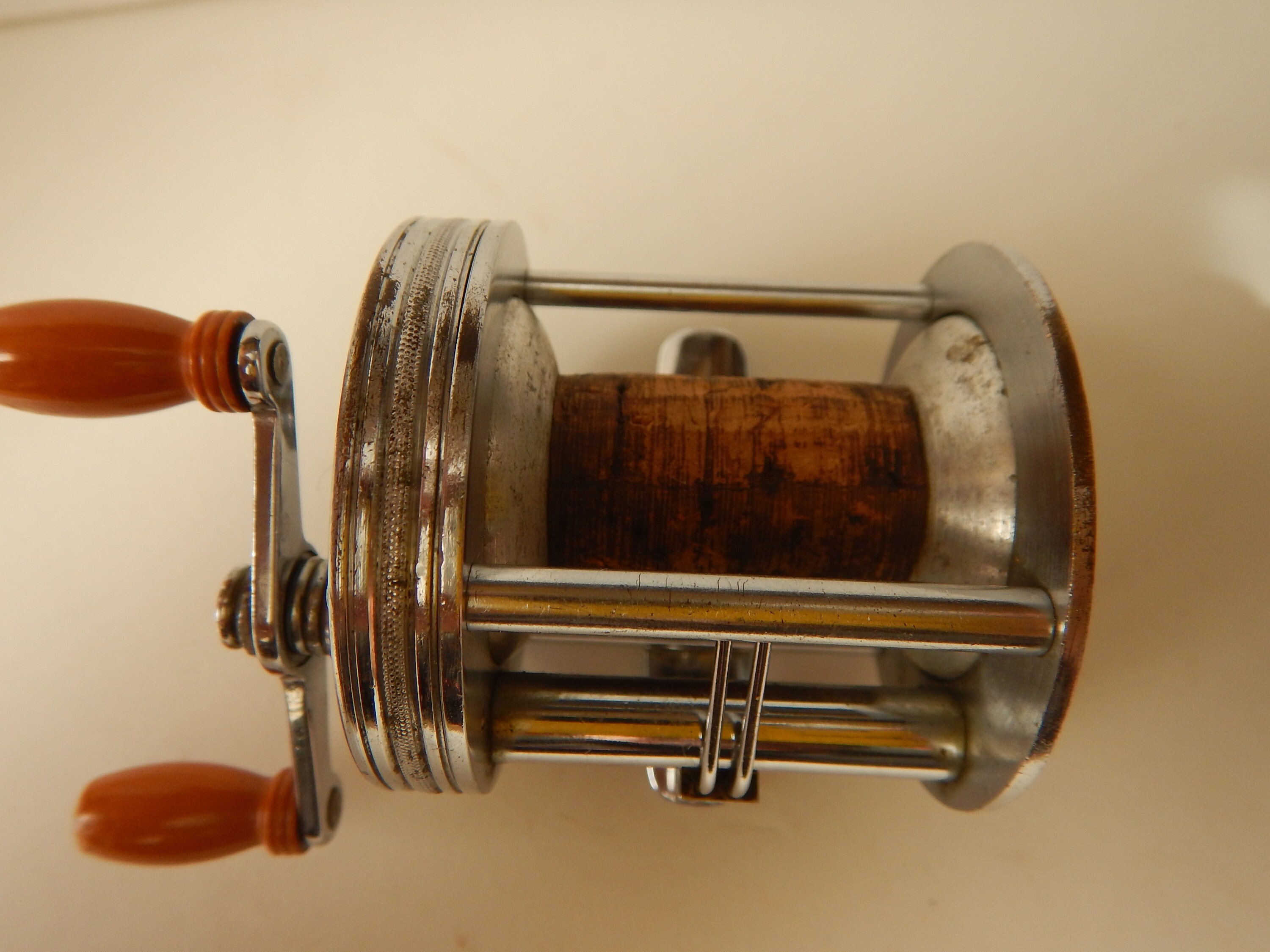Vintage J. A. Coxe model 60 casting fishing reel. Circa