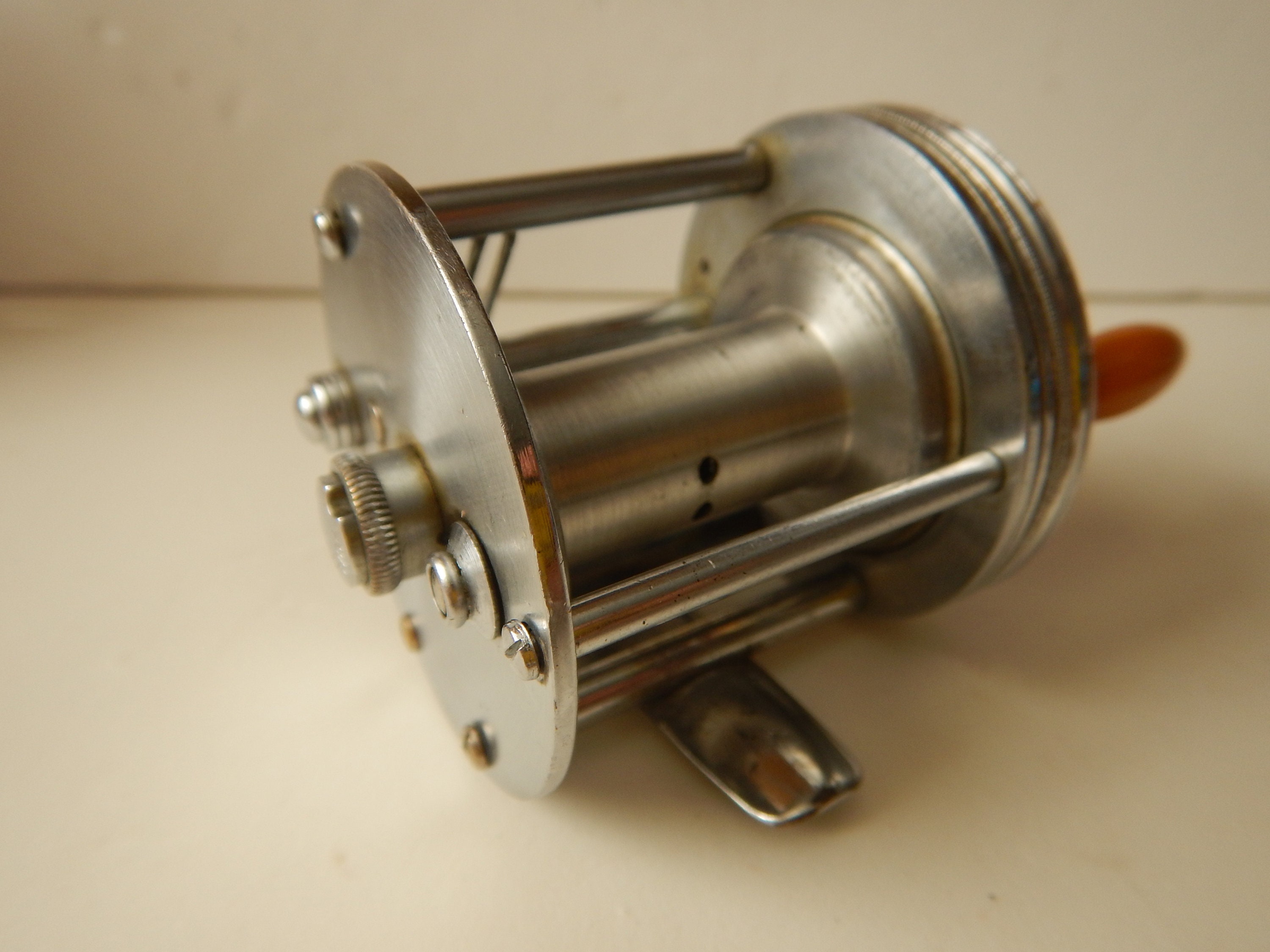 Vintage J. A Coxe model 60 casting fishing reel. Circa